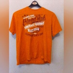 This is a beautiful XL bright orange Griffin shirt